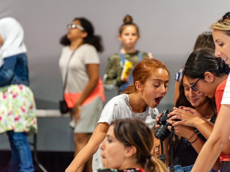 SURA students learning photography in Dearborn. Photo by Timothy J. Seppala