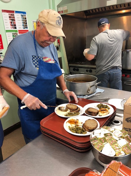 Baldwin Center soup kitchen volunteers prepare meals for hungry clients.