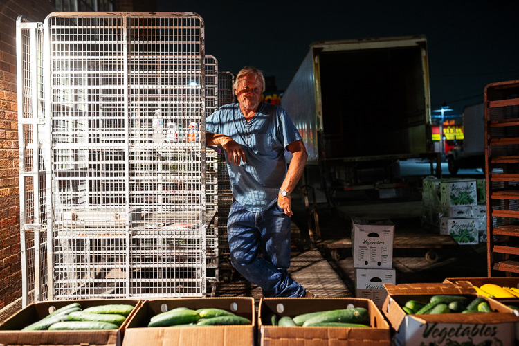 Brendan Bielat selling cucumbers and yellow squash. Based in Richmond, MI, his company Brendan Bielat Greenhouses has been selling at the wholesale market for close to 40 years.