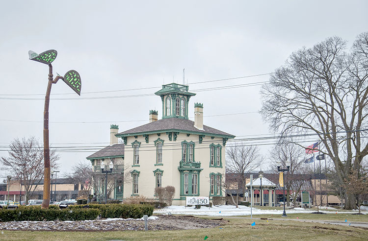 The old and the new in Sterling Heights. "The Seed" at left.