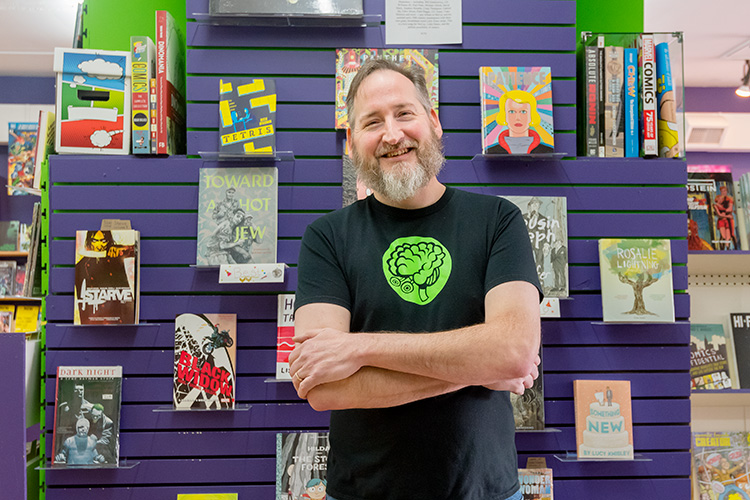 Dan Merritt at Green Brain Comics. Photo by Doug Coombe.