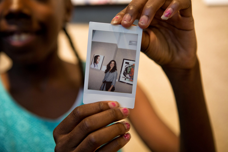 Destiny photographs her portrait artist. Photo by Nick Hagen.