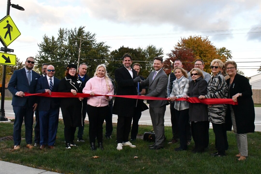 Cutting the ribbon on a new crosswalk at Stevenson High School. (City of Sterling Heights)