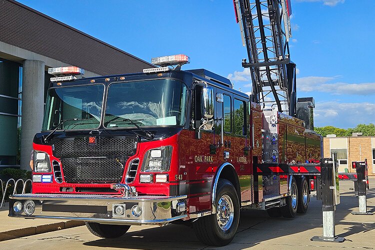 The new truck has a ladder that can extend up to 107 feet.