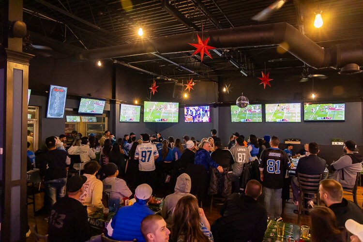 Things got tense as the game wore on, as the crowd at Joey B's Public House leans in to will the team closer to victory.