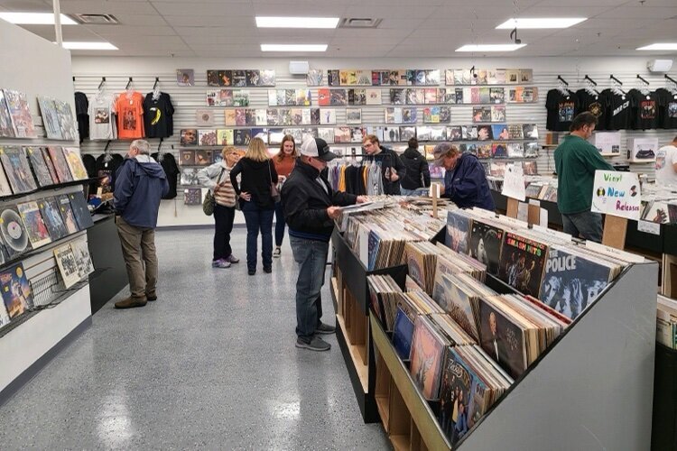 Music fans check out the new Dearborn Music in downtown Farmington in 2021.