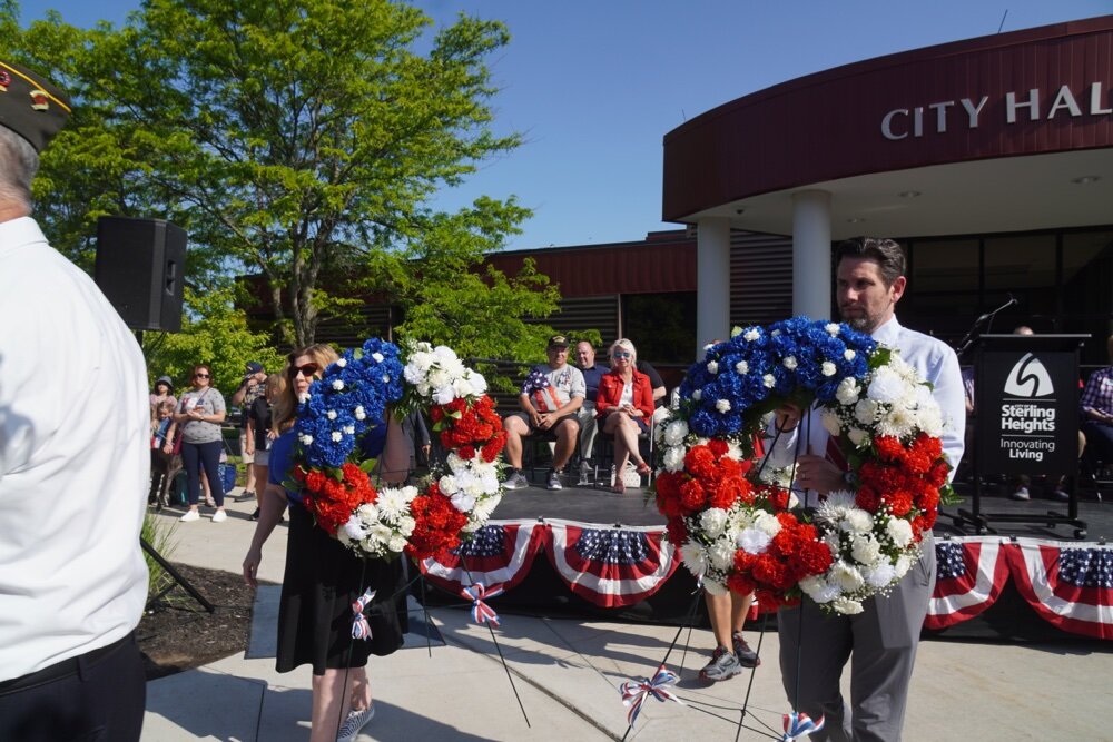 Mayor Michael C. Taylor (right) and the laying of the wreaths.