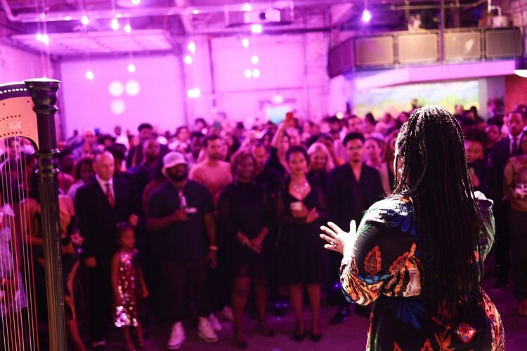 Kiana Wenzell holds the audience captive at the "Building a Lasting Legacy" exhibit.