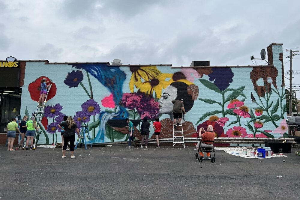 For this year’s mural, titled “Replenish,” students started putting paint to brick on July 11 and finished July 29, spending approximately three hours each morning, three days a week, on-site.