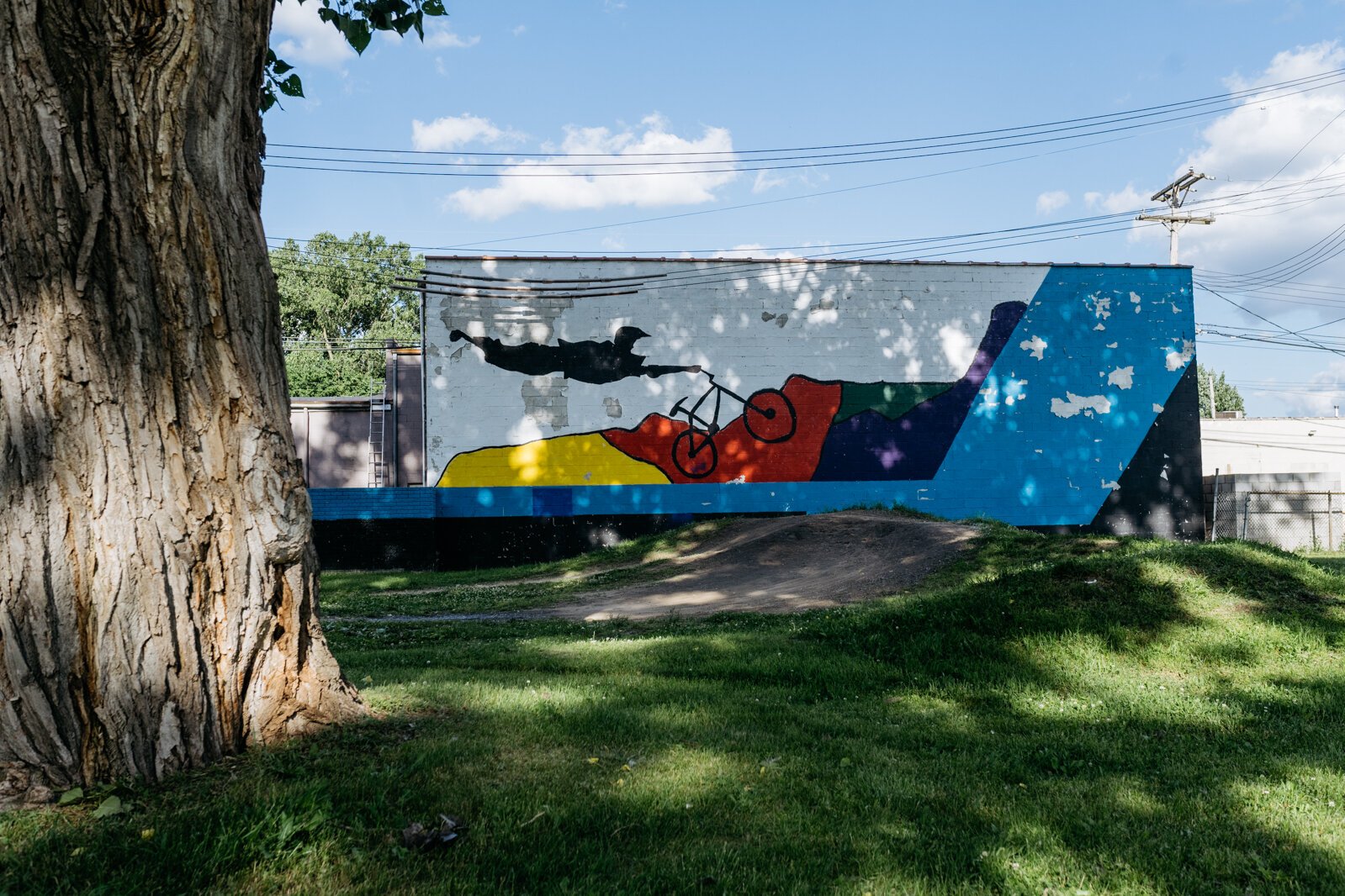 At Fuller Park, a BMX image promotes the popular pastime at the park, artist unknown.