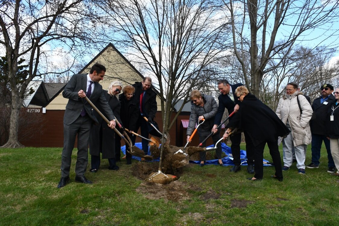 A ceremonial tree planting in recognition of Arbor Day. Sterling Heights has won 37 consecutive Tree City USA Awards.
