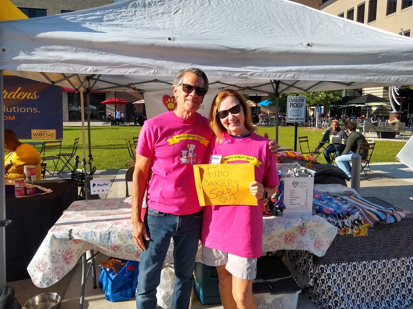 Volunteers from Friends for Animals of Metro Detroit at a farmers market event earlier this year.