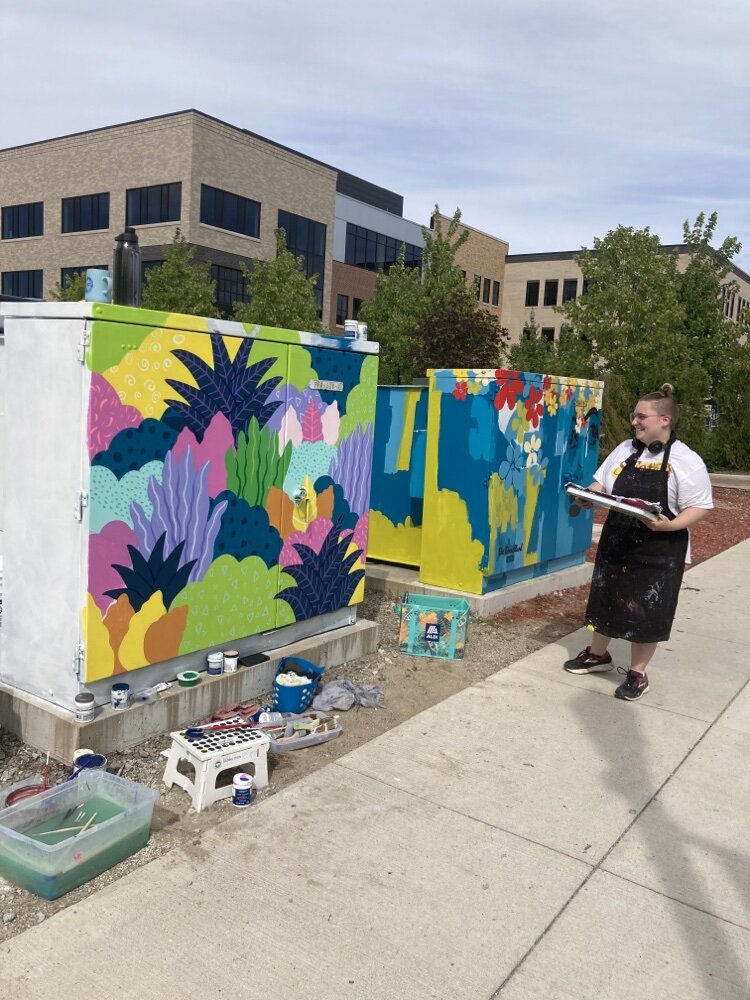 Simmons and her ZAP! mural.