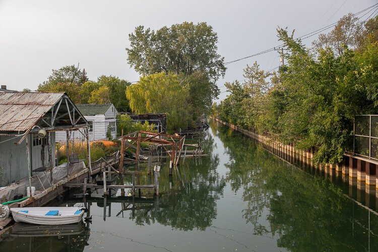 The Fox Creek Canals in Grosse Pointe have seen water levels rise with recent rainfall, prompting residents to add "tiger dams" to protect properties.  Photo: David Lewinski.