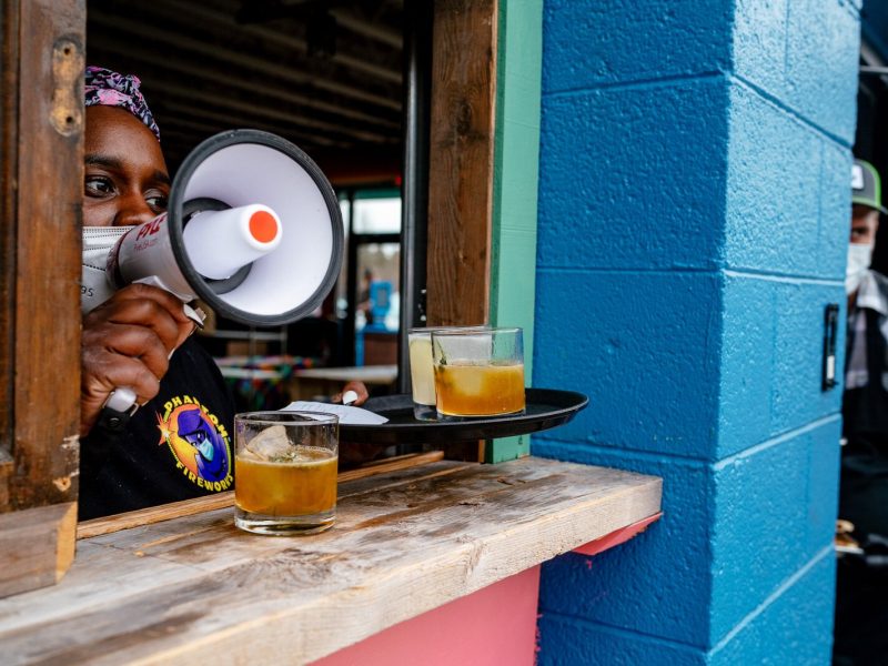 Ariell Jones works the bar. Coriander Kitchen and Farm. Photo by Nick Hagen