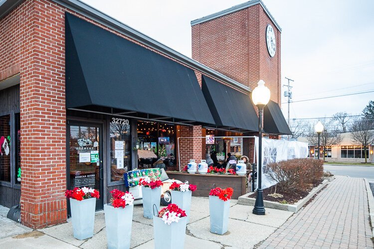 “If there’s a 30-minute wait for a patio seat, people can grab a cocktail and walk to the park,” says Scot Pelc, co-owner of Sidecar Slider Bar