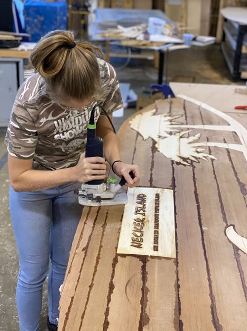 Maddy Rice hones her skills on a board. 
