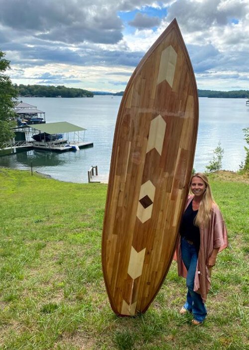 Kristy Petrillo shows off her new paddle board.