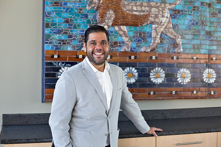 Chaldean Community Foundation COO Paul Jonna proudly shows off the new premises on 15 Mile Road.