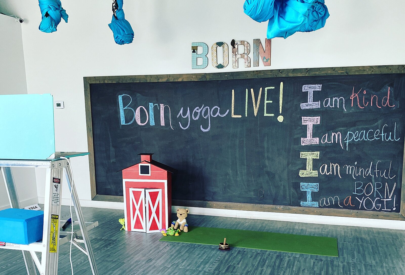 An online version of a yoga class, set up here for Born Yoga, requires some creativity.