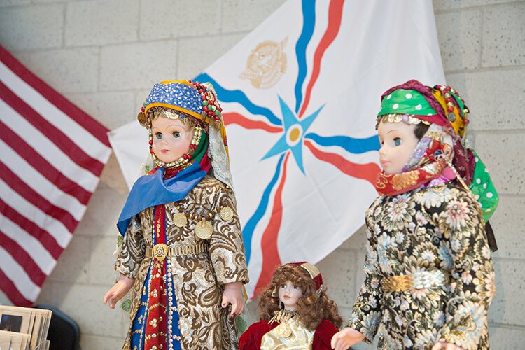 Cultural table displays showed off traditional garb from groups such as the Assyrian American Social Club.