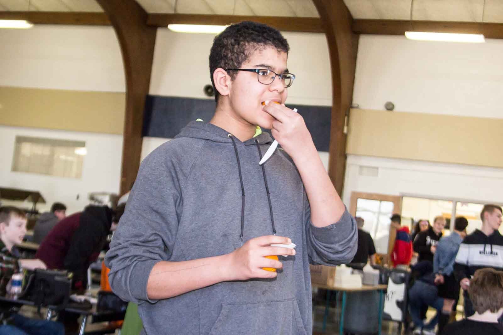 A Ring Lardner Middle School student participates in a March Madness tasting activity.