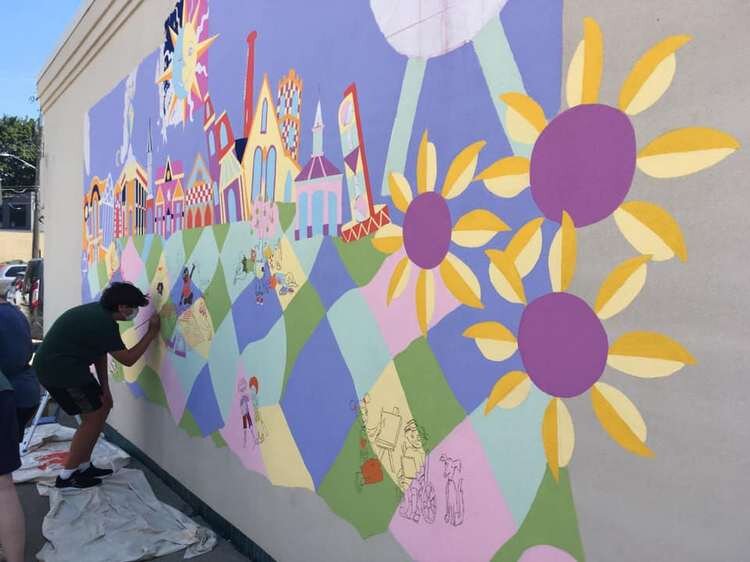 The mural in progress on Sunflour Bakehaus