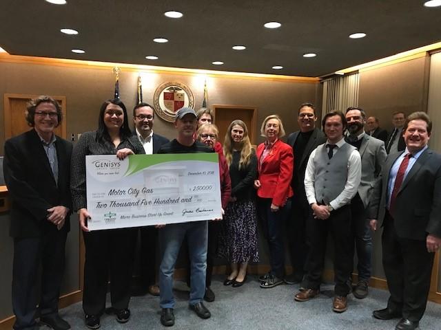 Royal Oak business Motor City Gas receives award from Genisys. Photo courtesy Oakland County.