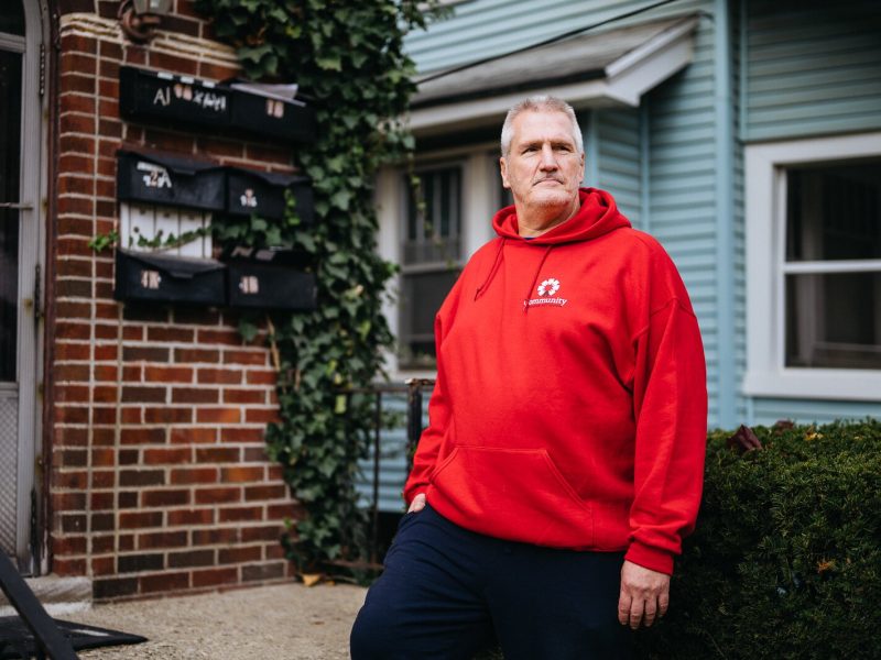 Ronnie Stienke stands outside his apartment in Pontiac. He credits finding housing with helping him to get sober after 32 years of addiction.