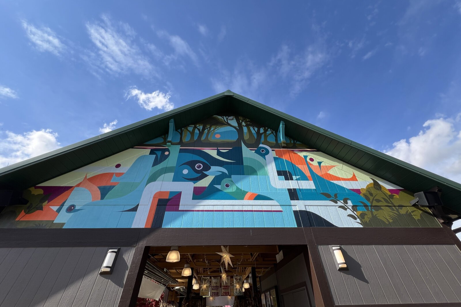 “With these gables, the one side is the summer side with summer colors, and the other side has more of a fall feel to it,” says artist Rick Malt.