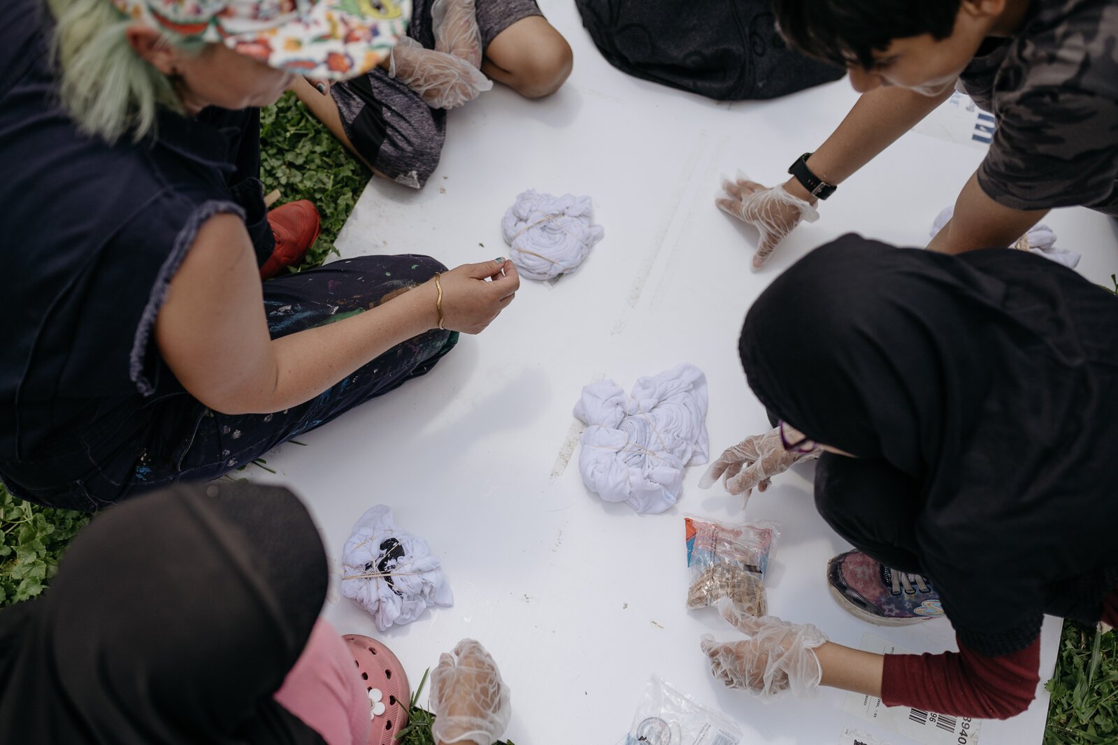 Camp Carpenter participants tie-dye shirts.