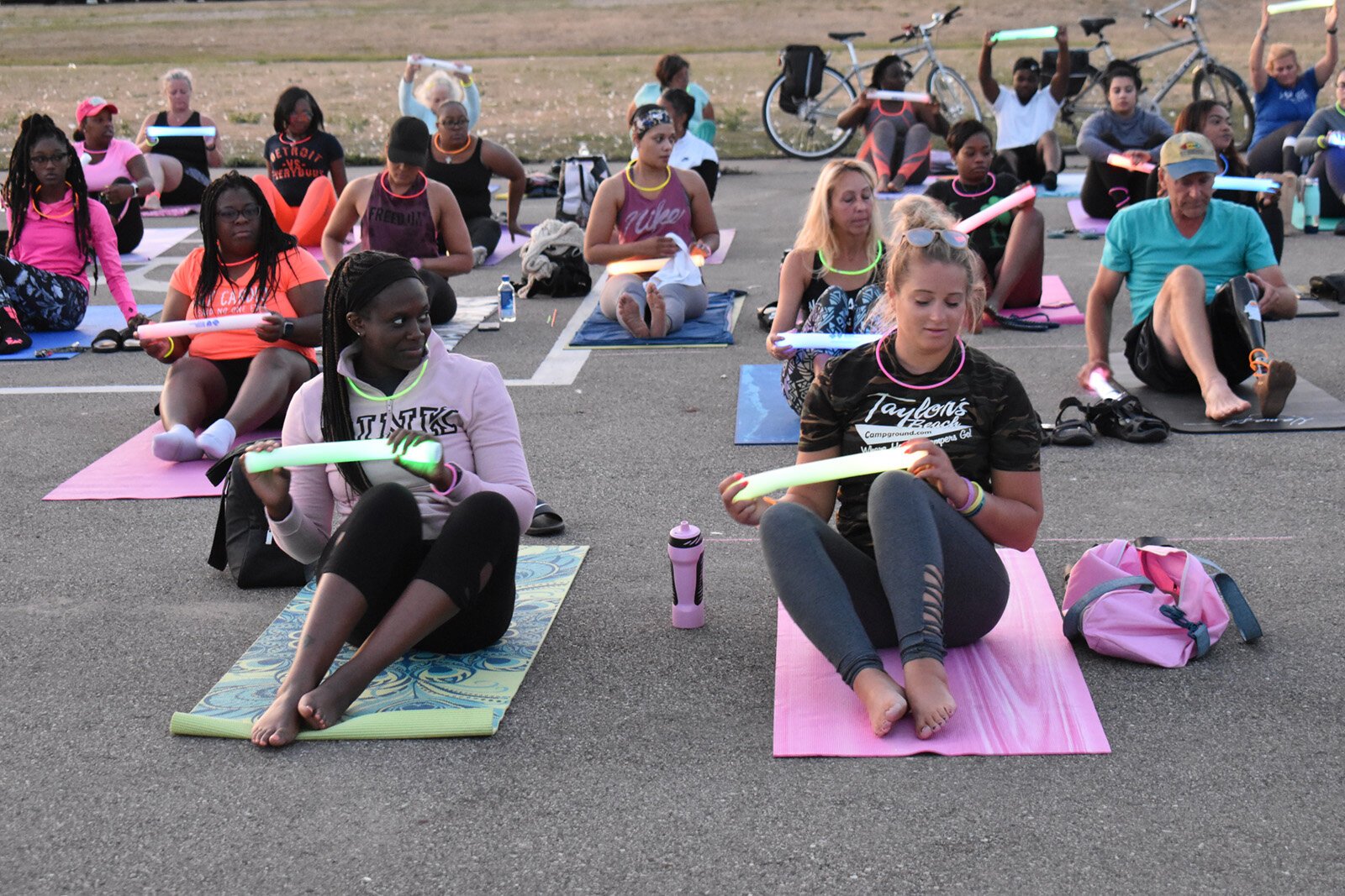 People participate in a Detroit Riverfront Conservancy yoga class.