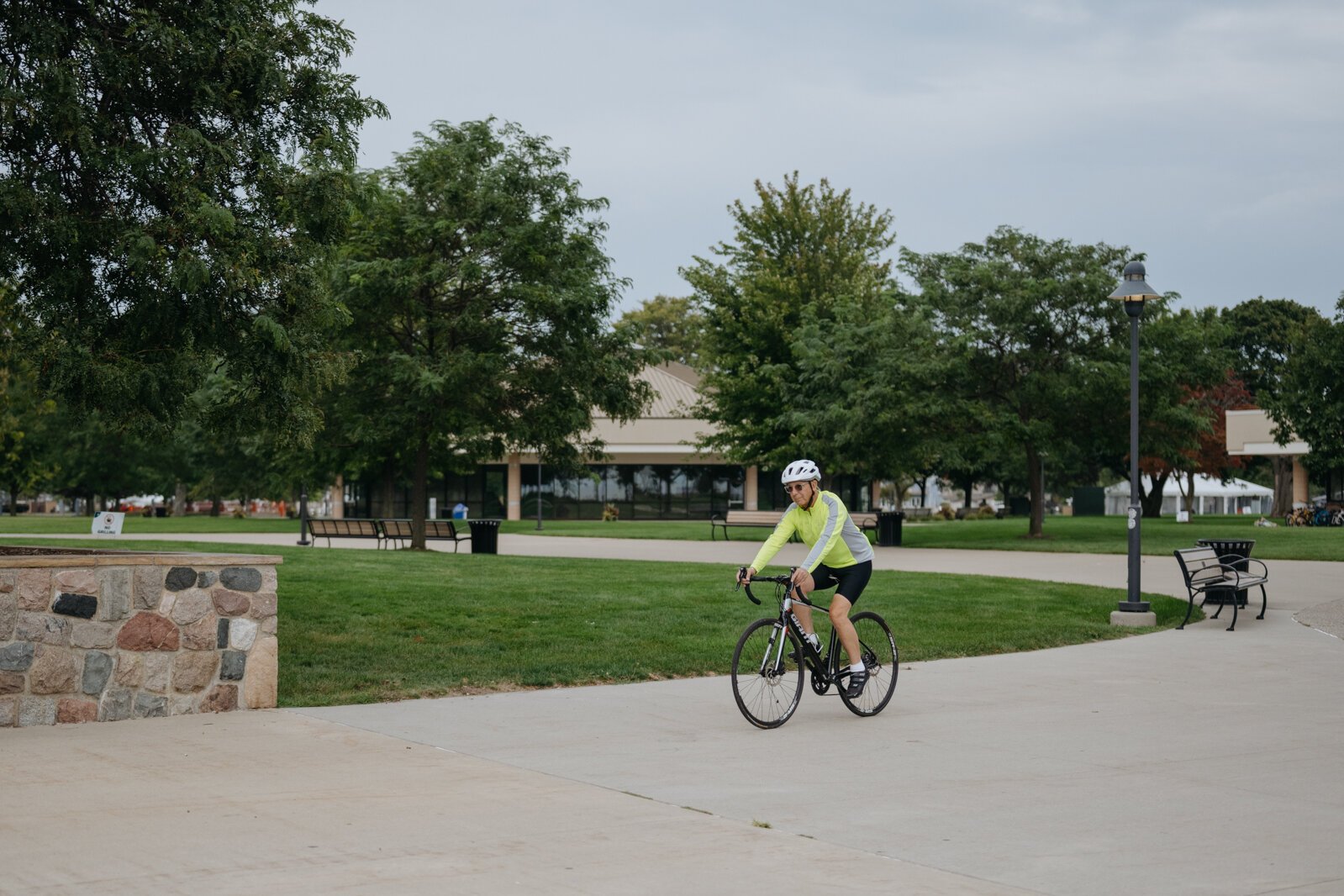 A person bikes at Lake St. Clair Metropark.