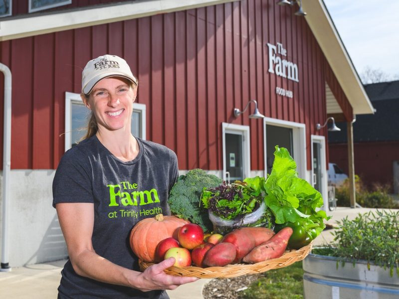 Jae Gerhart, manager of farm programs for Trinity Health Ann Arbor, at The Farm at Trinity Health in Ypsilanti. The Farm offers a produce prescription program for those who struggle to afford healthy food.