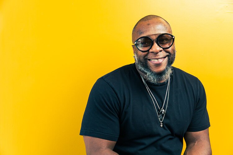 Joe Baskin, owner of Joe Edward Salon, strikes a pose