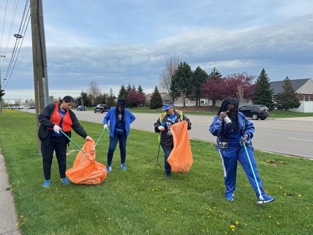 Adopt-A-Road volunteers cleaning up between 19 Mile and Hayes and Trainer.