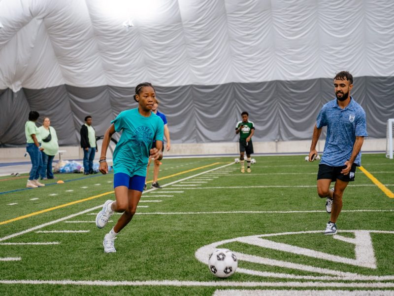 People enjoy the new Chandler Park Fieldhouse in Detroit at its grand opening on Aug. 21, 2025.