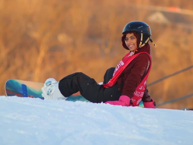 Nazma Begum on a snowboarding trip.