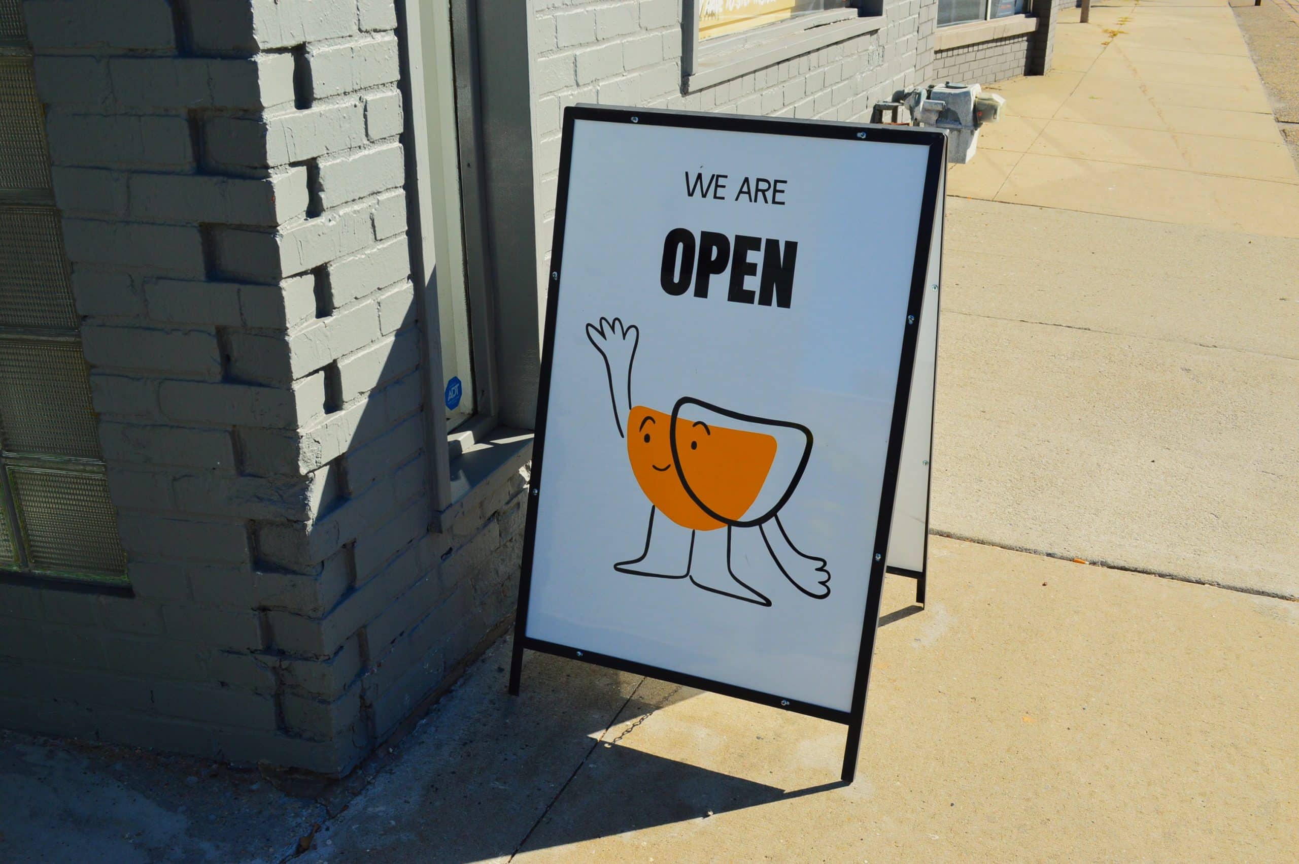The coffee shop's logo splashed in yellow inspired by the siblings roots. Genevieve Fox.