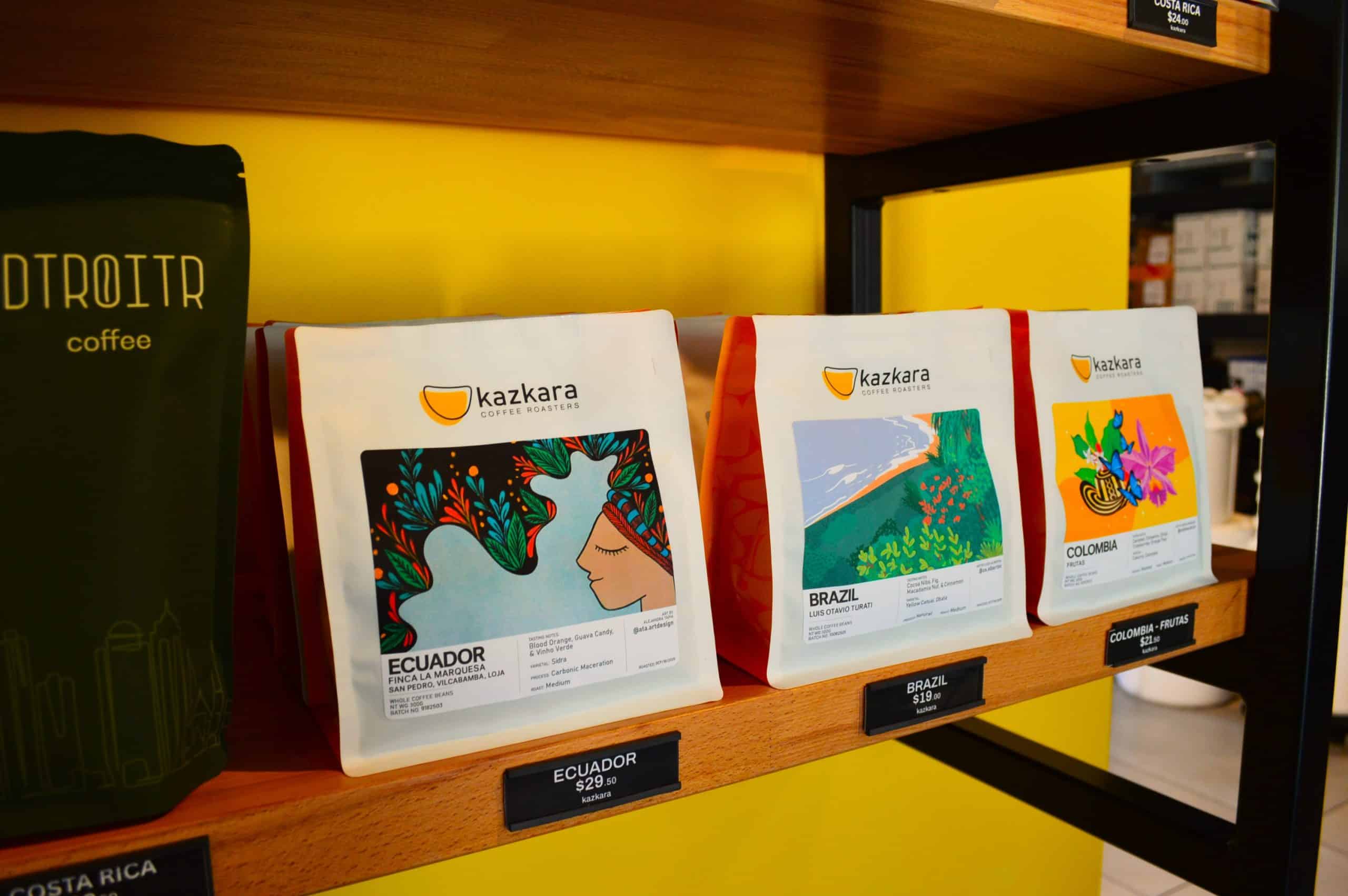 Inside there are coffee bags that display art created by artists. Genevieve Fox.