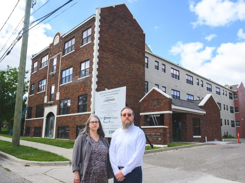 Kirsten Elliott, president and CEO of Community Housing Network, and Ryan Hertz, president and CEO of Lighthouse, at the construction site for Beacon Square Apartments and Beacon Townhomes in Pontiac.